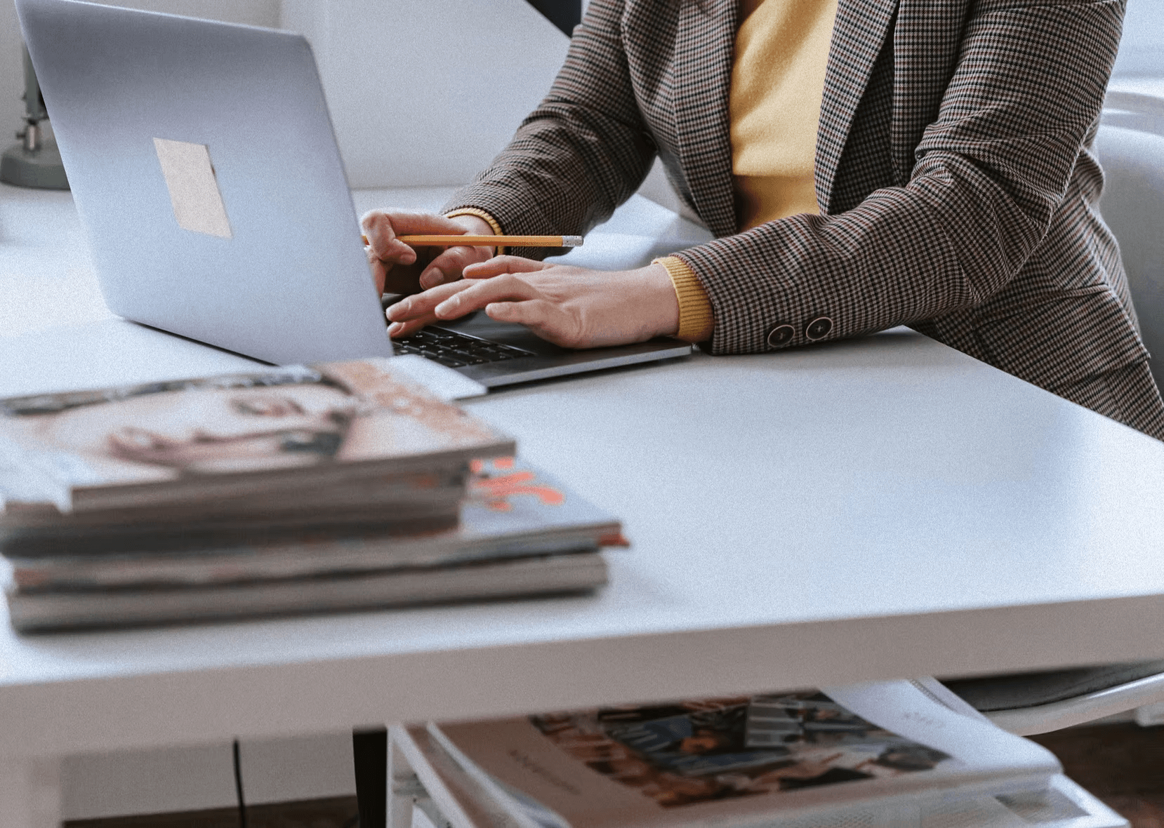 Person typing on a laptop